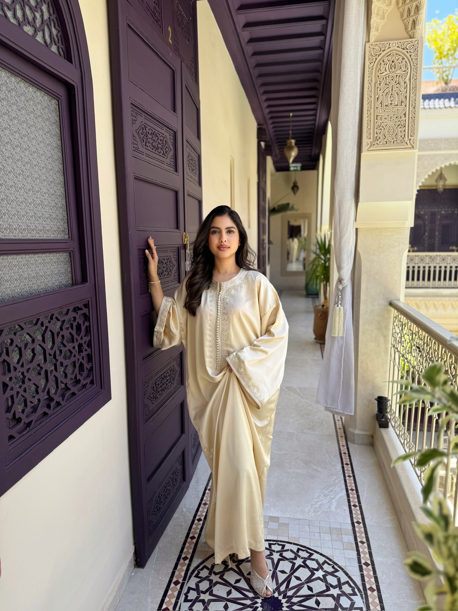 Elegant ivory gandoura styled for Eid celebrations and special occasions