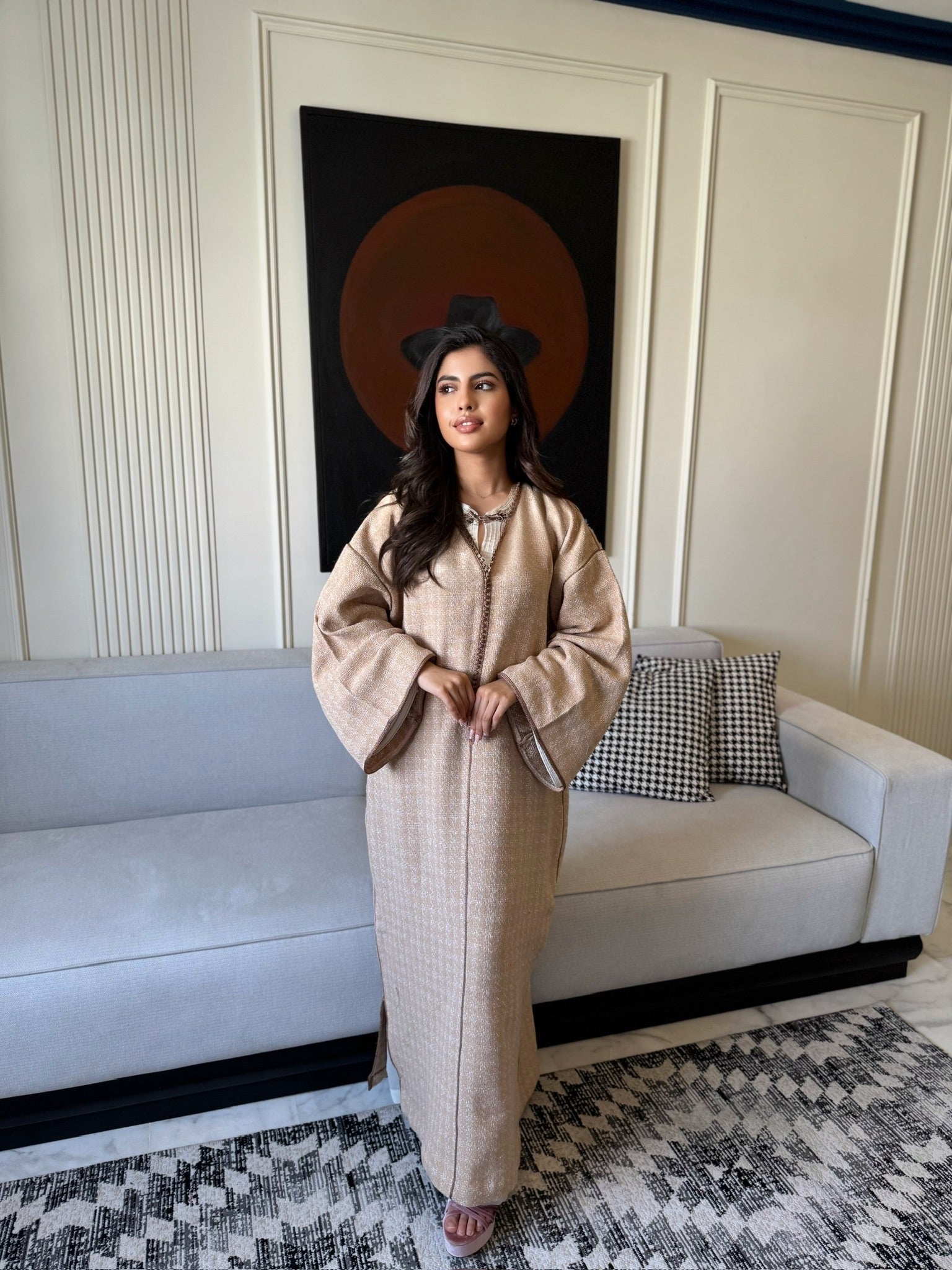 Elegant beige caftan styled for Eid celebrations and special occasions