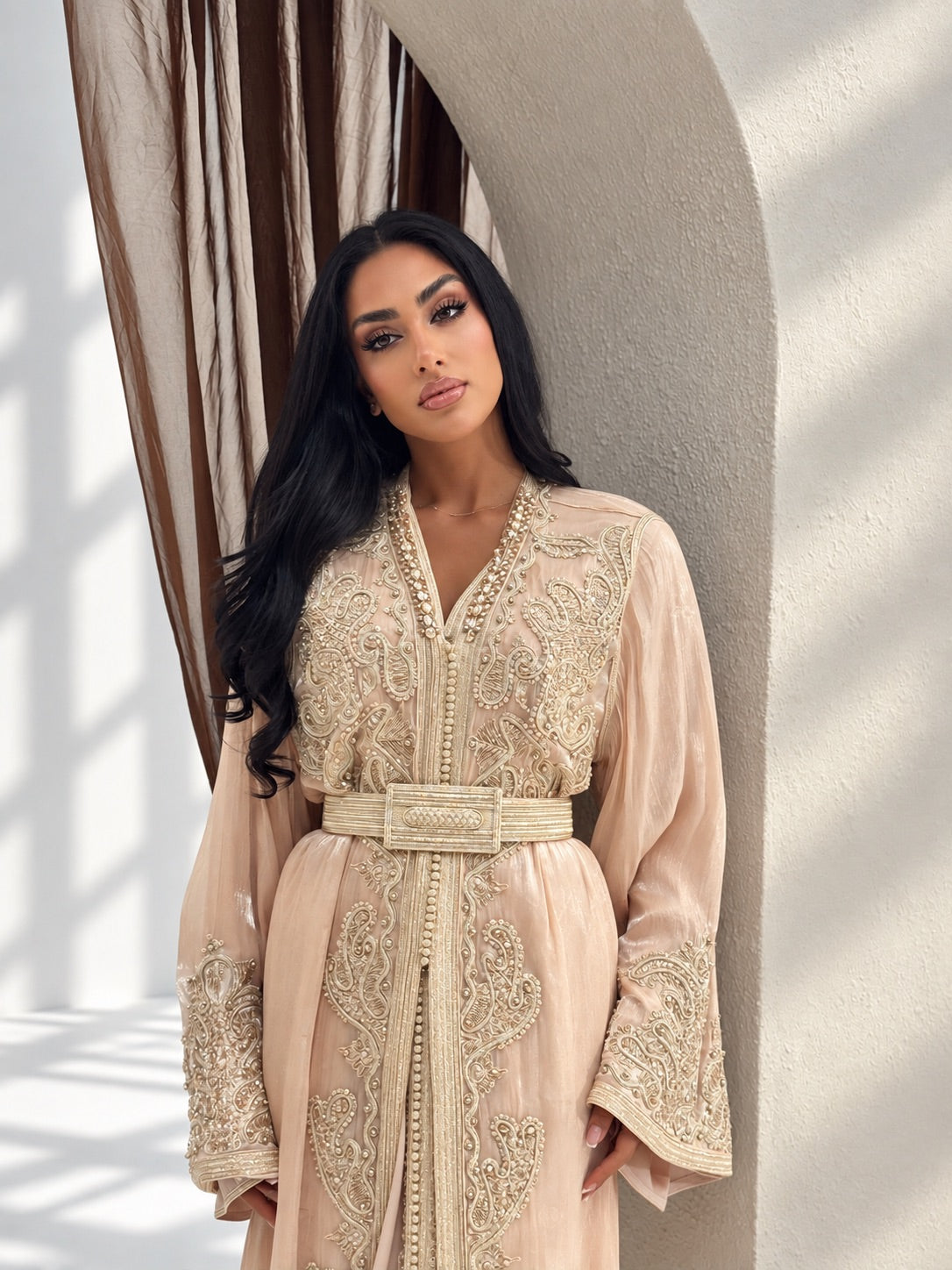 Elegant beige Moroccan takchita dress with traditional detailing