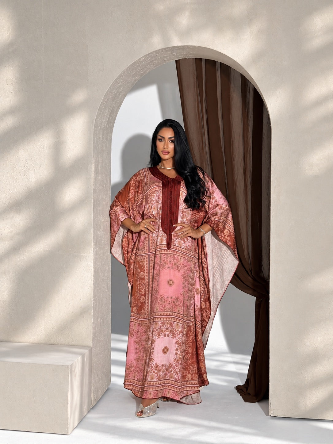 Elegant burgundy Moroccan gandoura with flowing sleeves