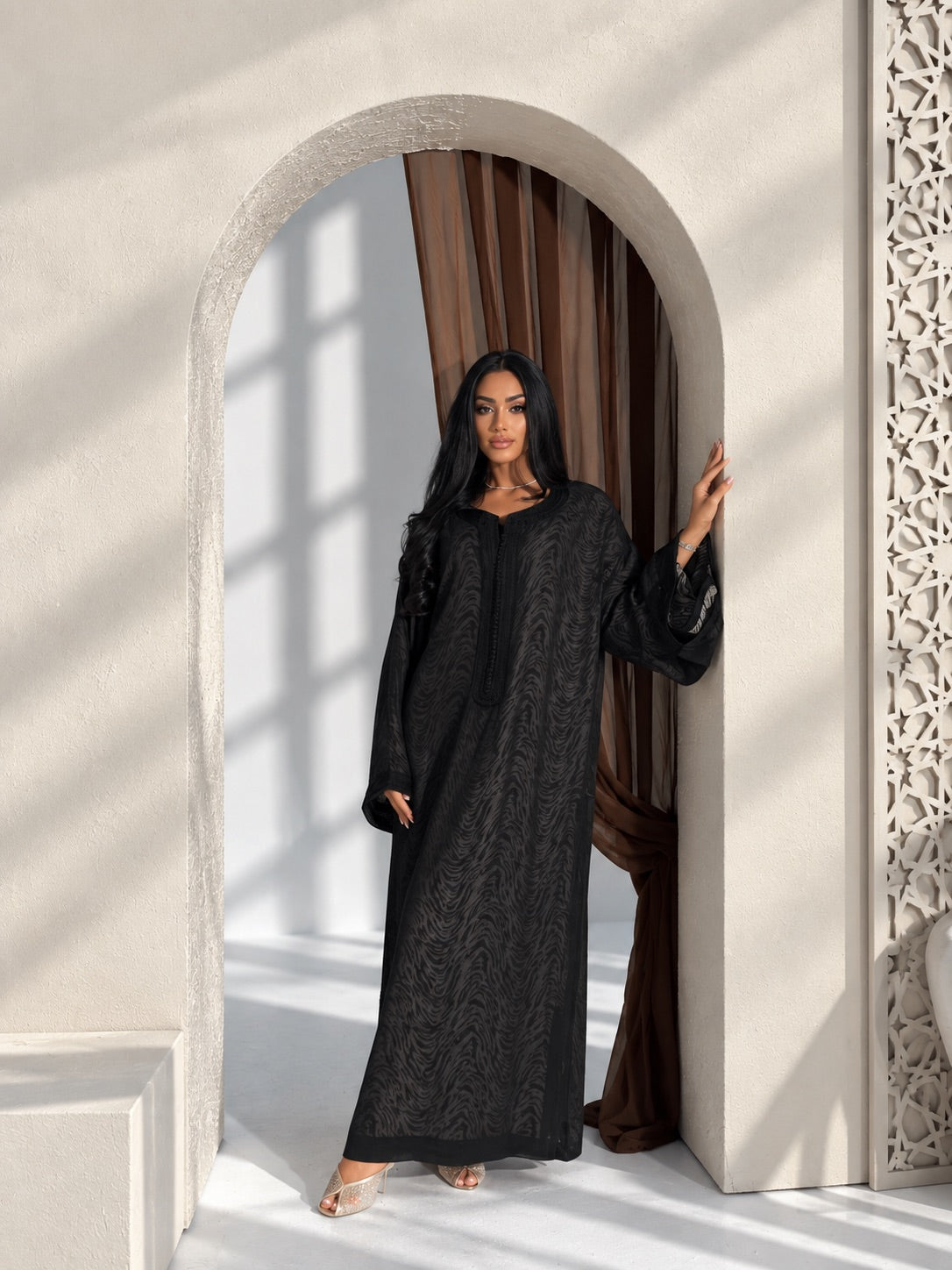 Elegant black Moroccan kaftan two-piece with flowing sleeves
