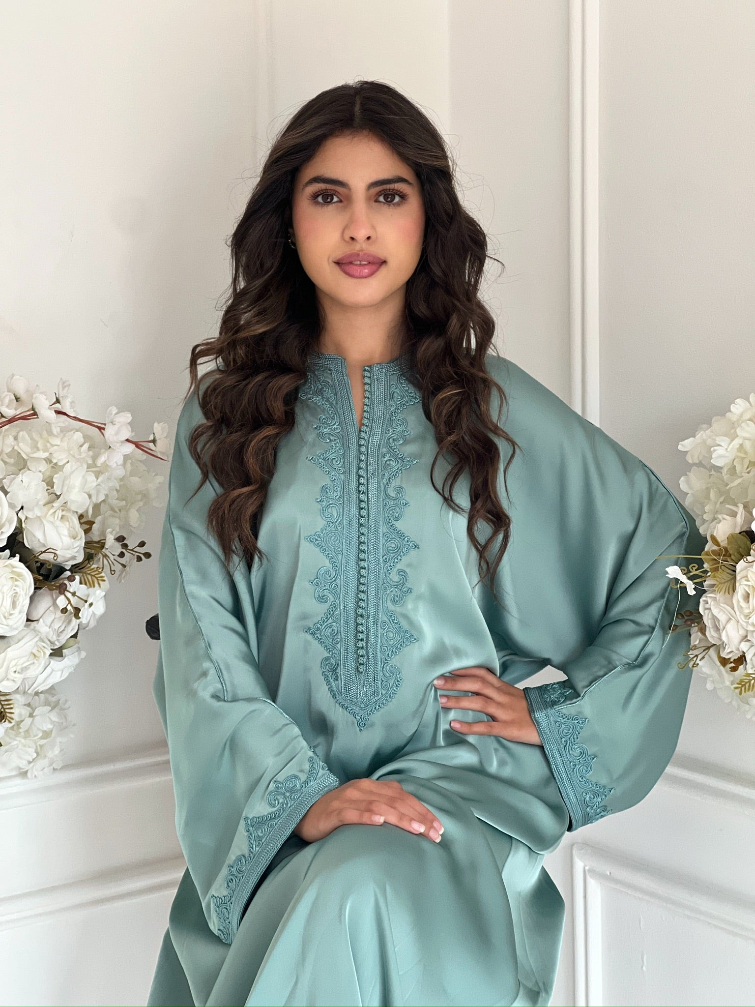 Model wearing the mint green gandoura
Lina Moroccan dress with embroidered details.