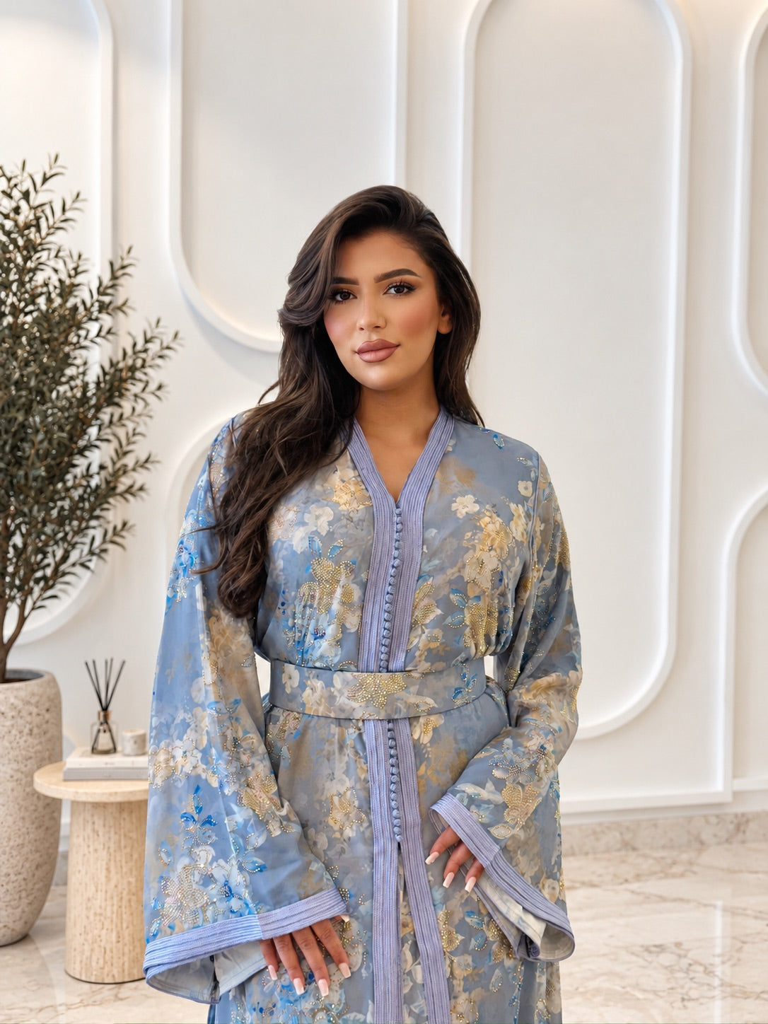 Takchita Rawan blue silk Moroccan takchita with gold floral detailing and matching belt, close-up front view