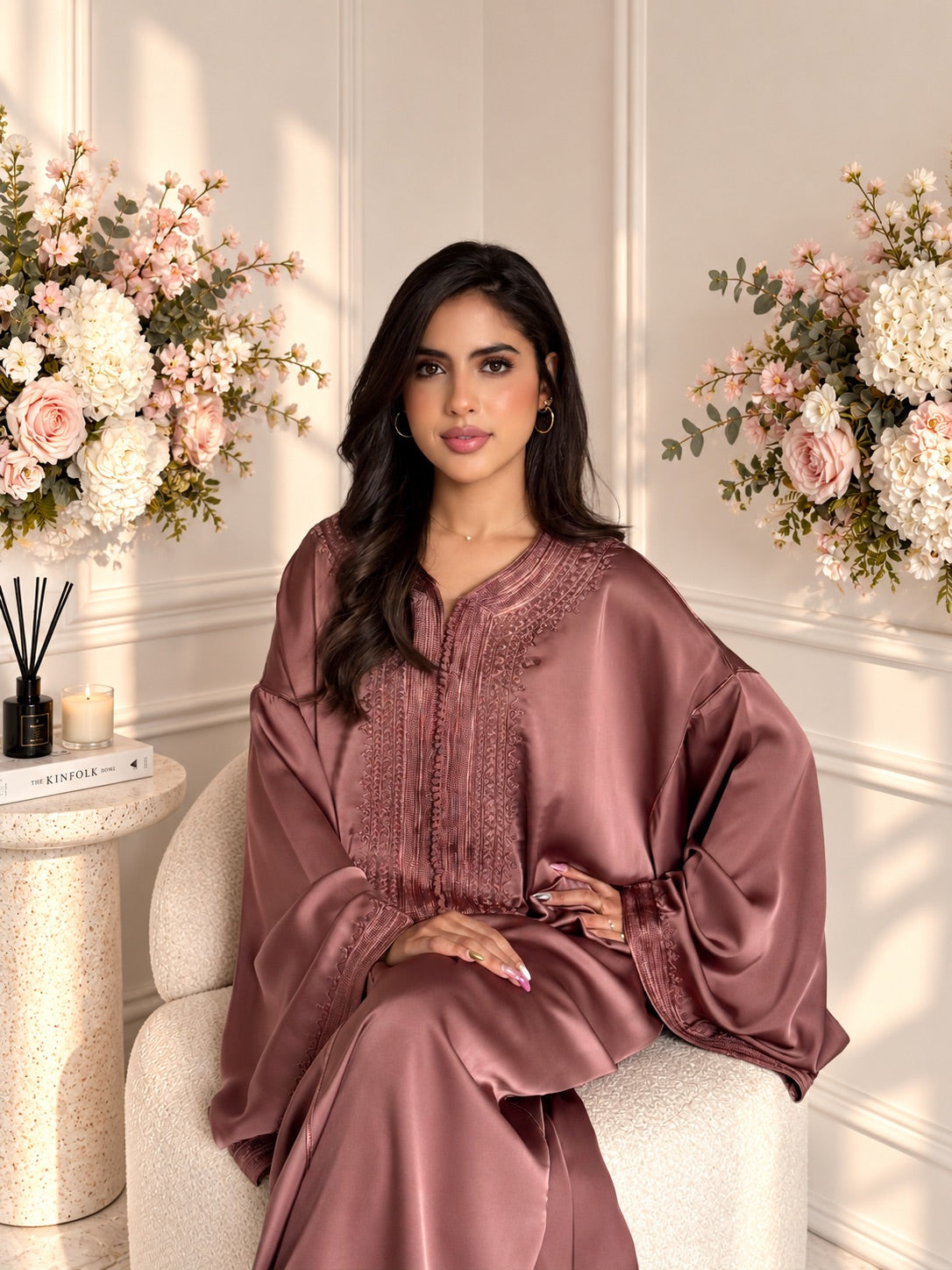 Model wearing mauve Gandoura Laila with tonal embroidery around the neckline and wide sleeves