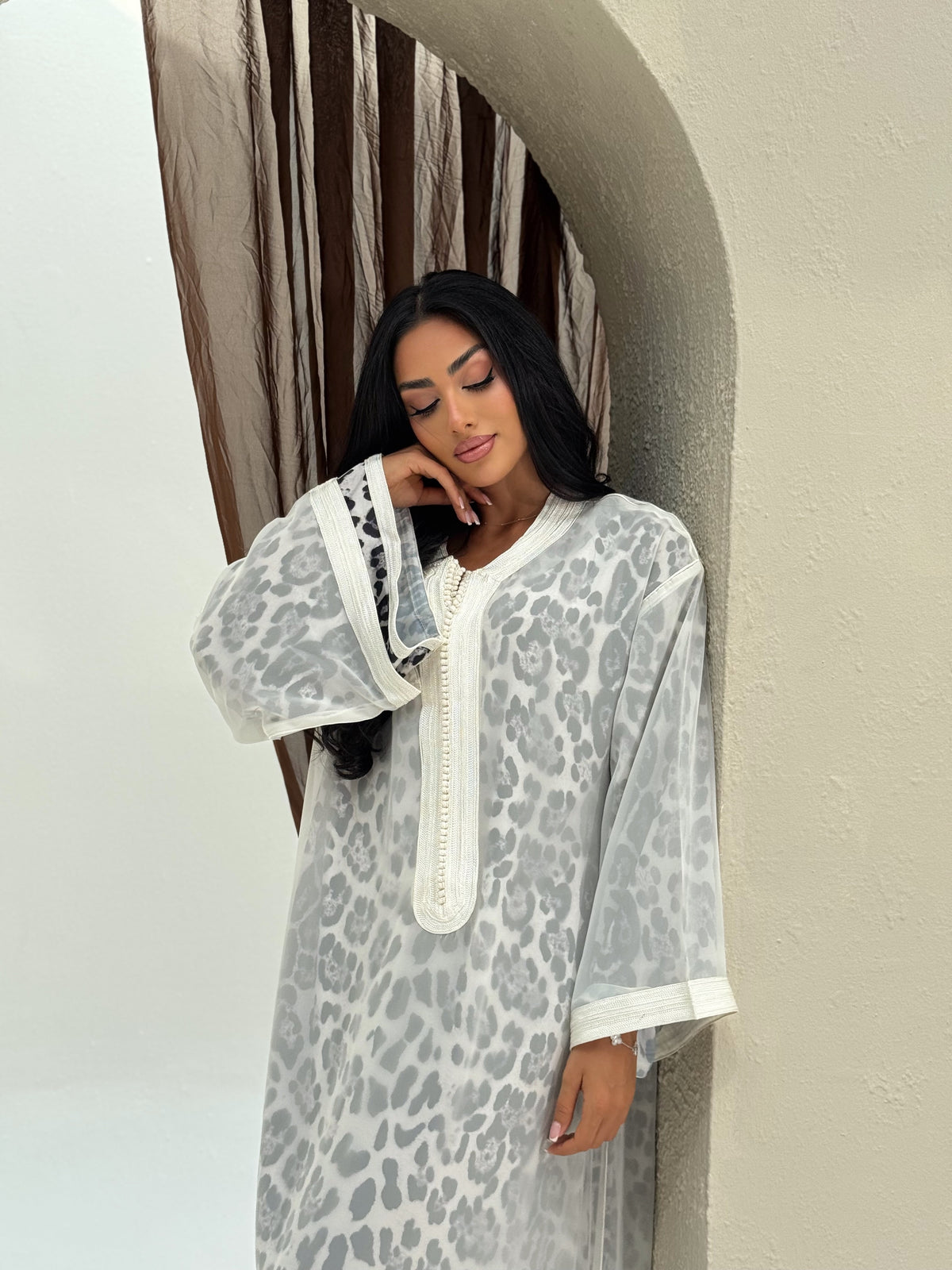 Elegant leopard print Moroccan gandoura with traditional detailing