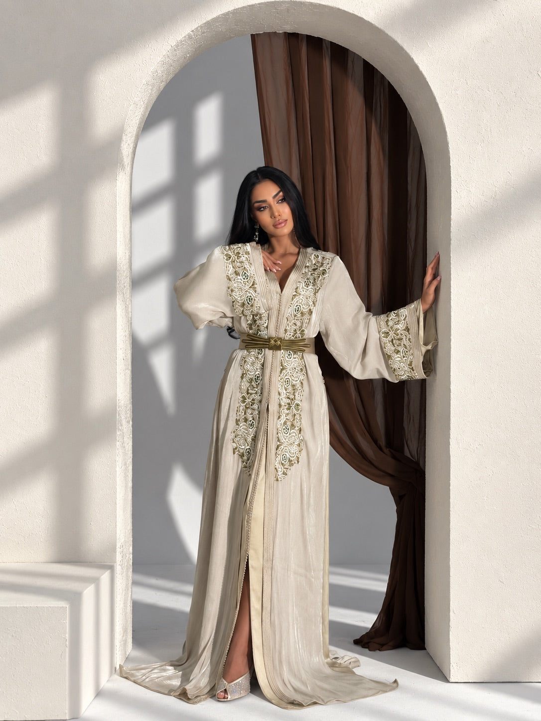 Elegant ivory Moroccan takchita dress with traditional detailing